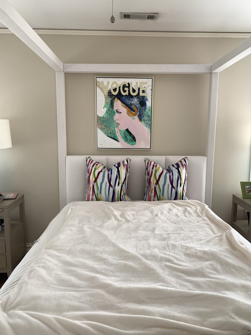 White canopy bed, straight-on