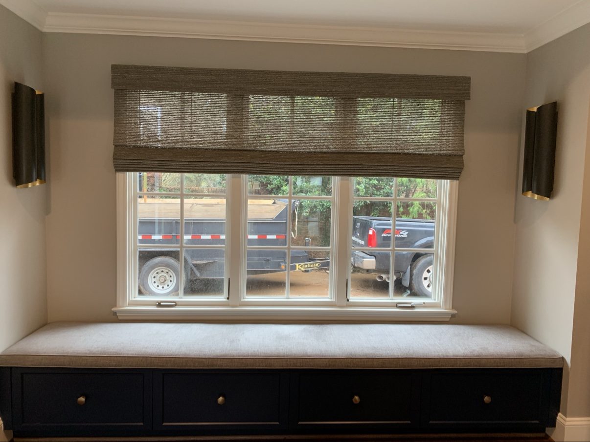 Window seat over navy drawers