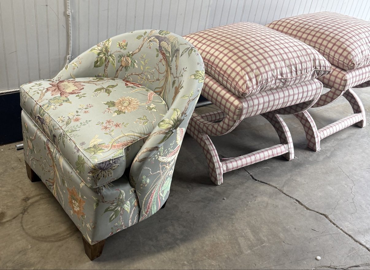 Floral barrel chair + plaid X-frame benches