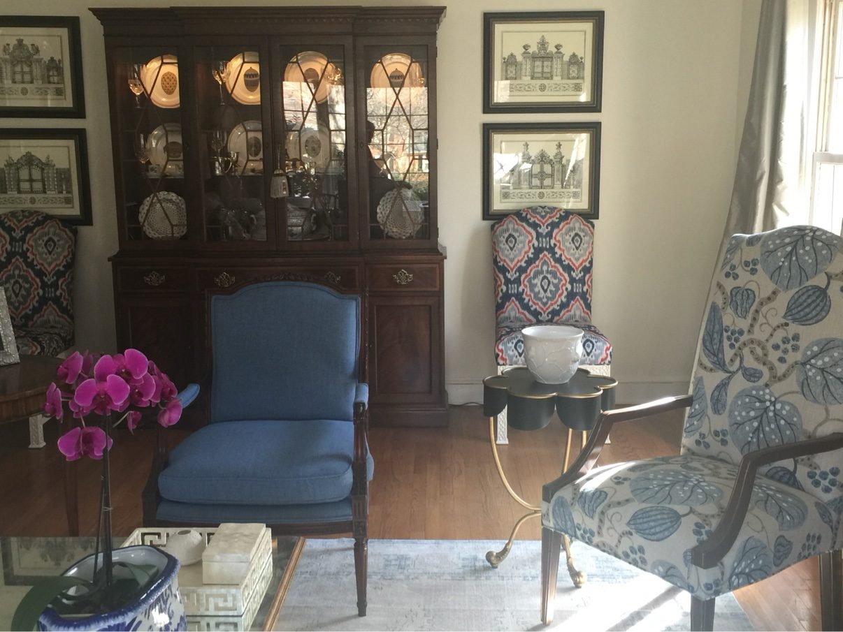 Formal living room, blue + patterned wing chairs