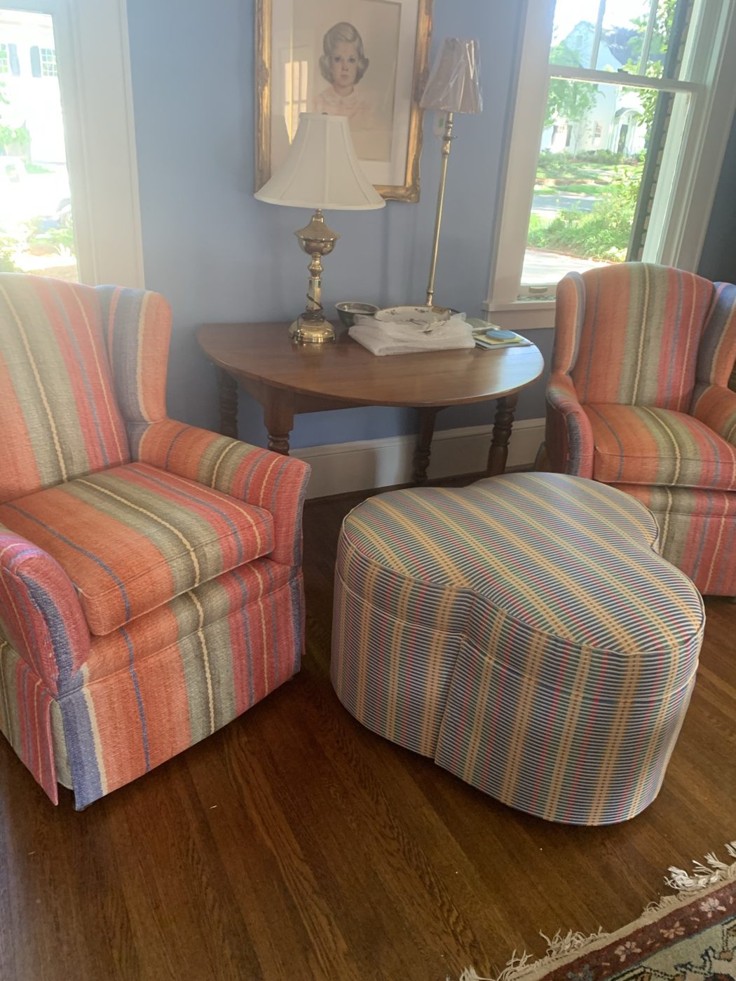Striped swivel chairs + oval ottoman