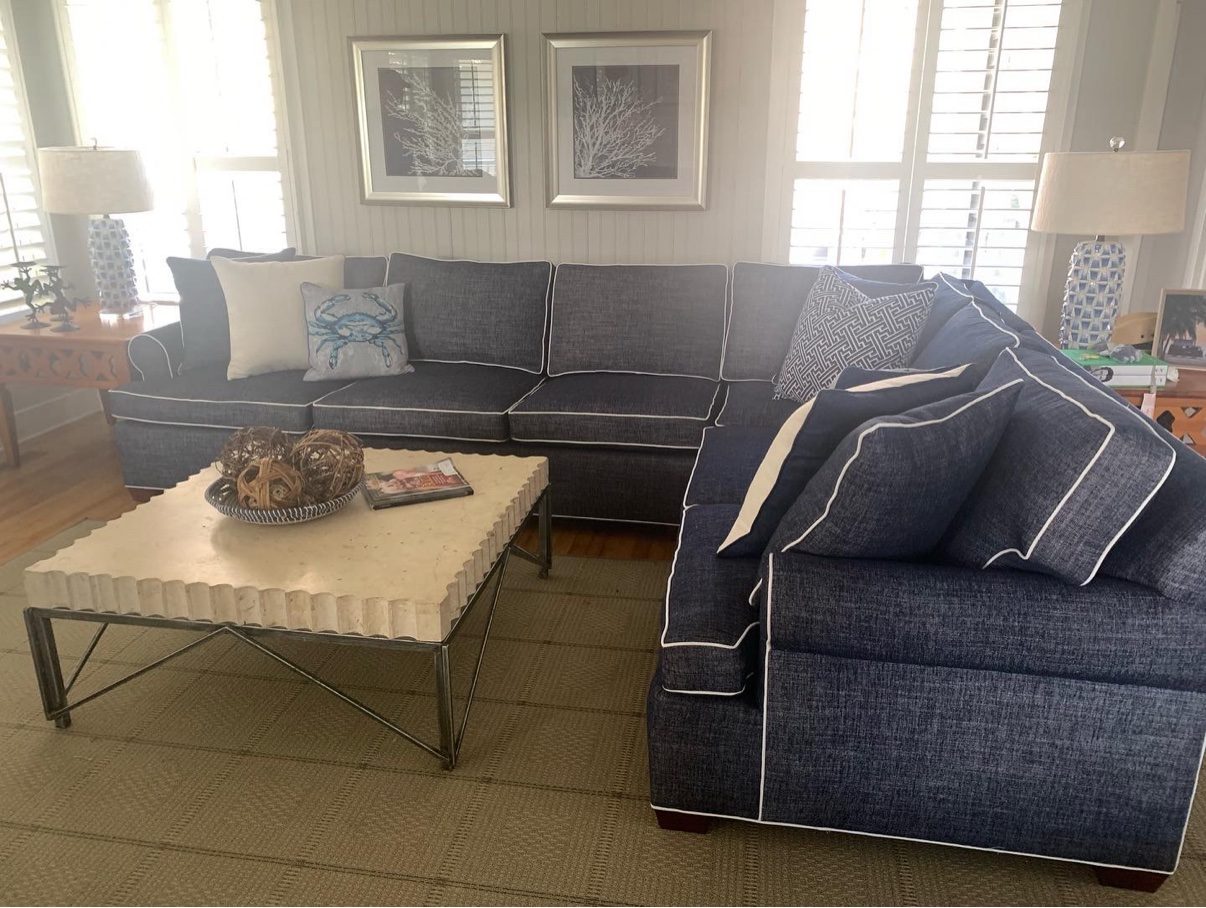 Navy sectional with white piping