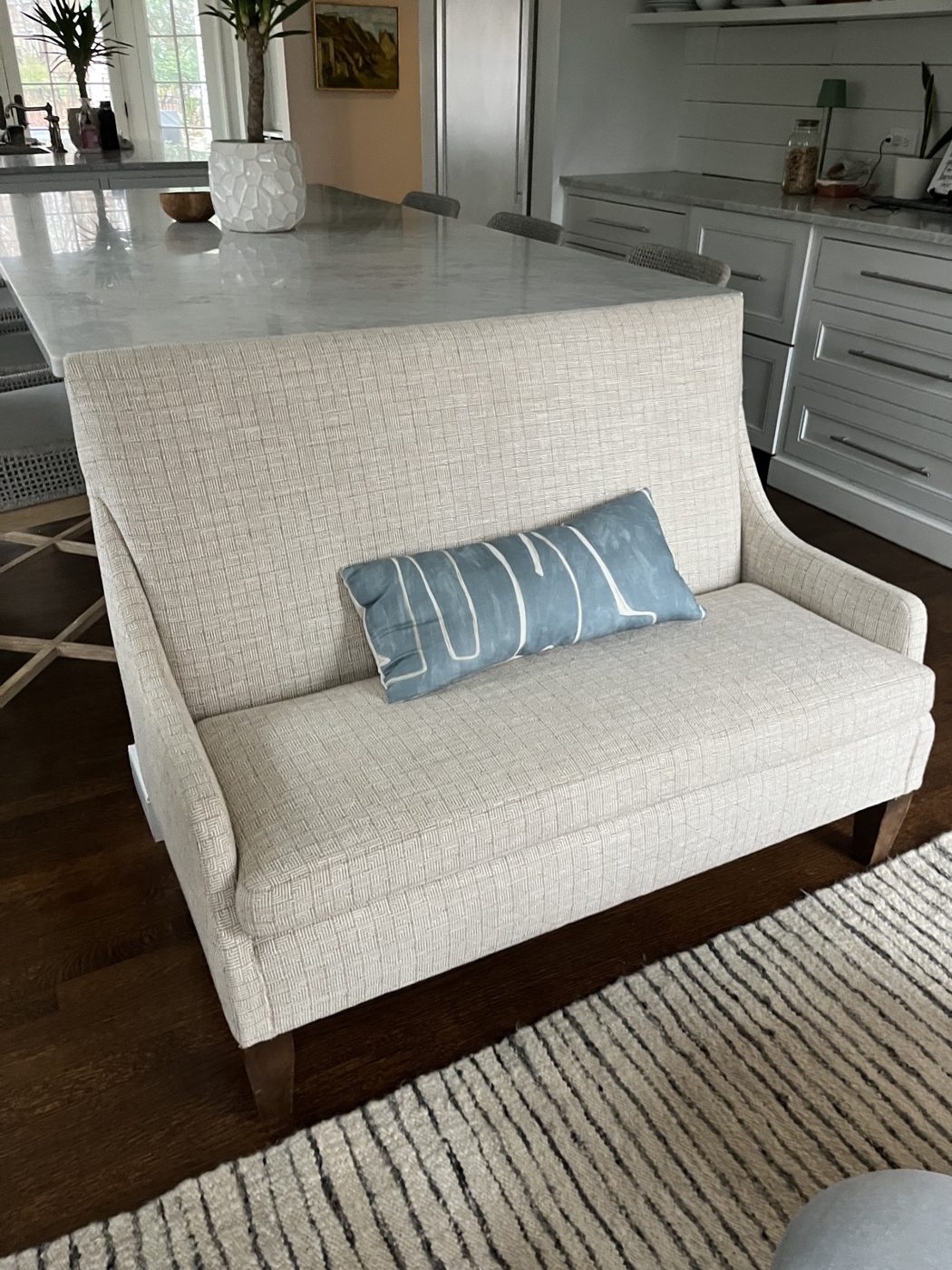 Cream high-back kitchen settee