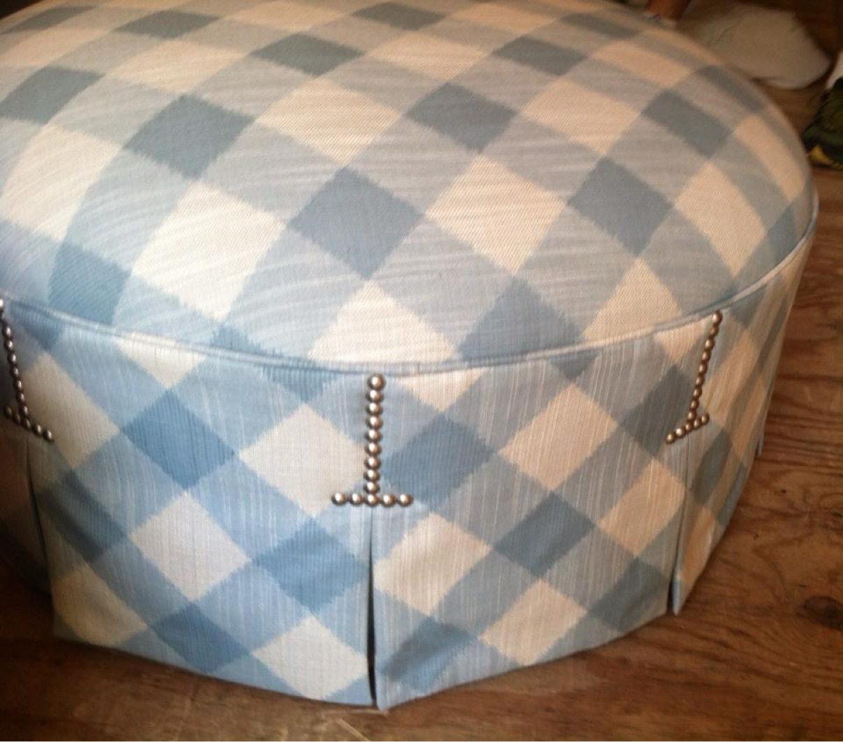 Blue gingham ottoman with nailhead pleats