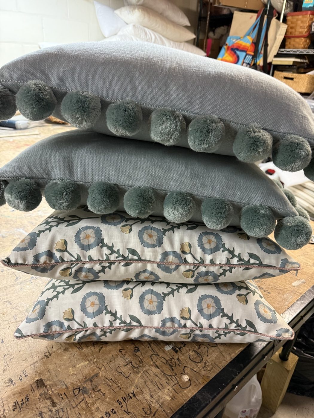 Custom pillows with pom-pom trim