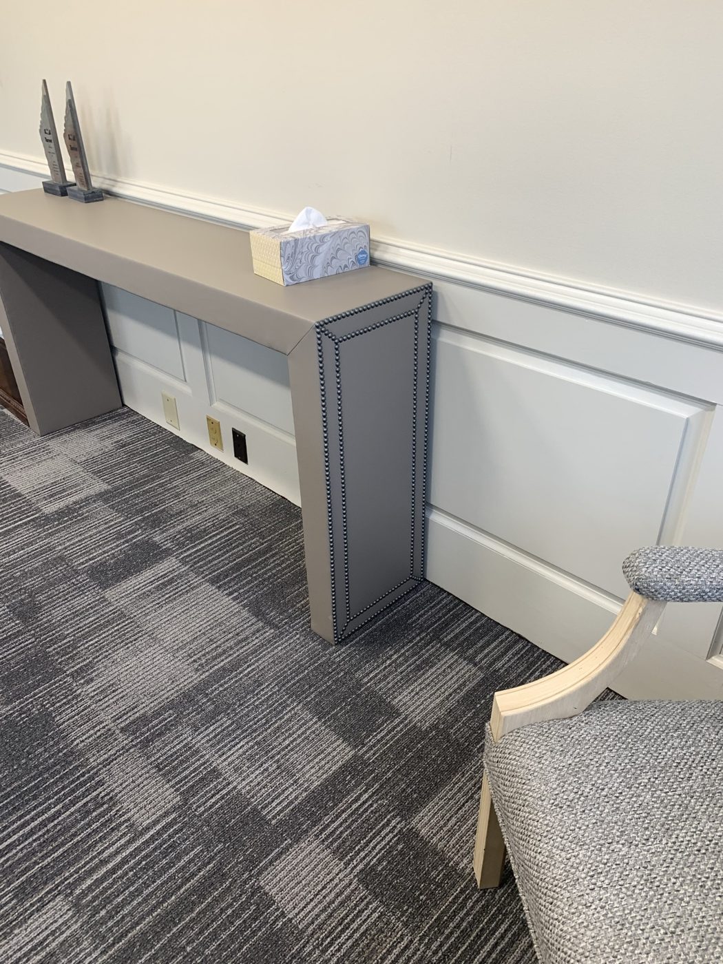 Office console against wainscoting