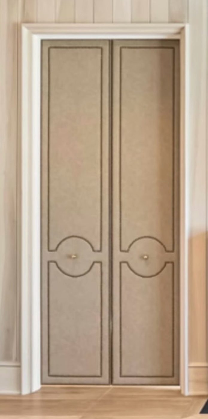 Taupe double doors with circle motif