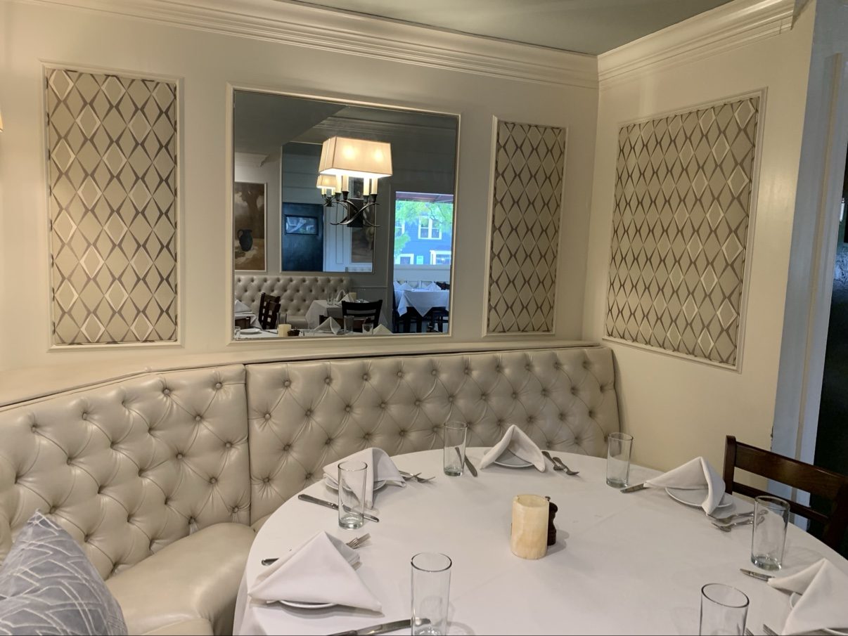 Dining nook with panels + mirror