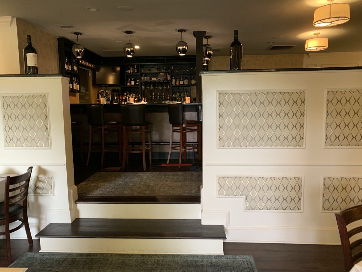 Bar entrance with paneled dividers